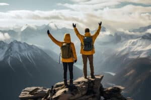 Two Hikers Celebrating on Mountain