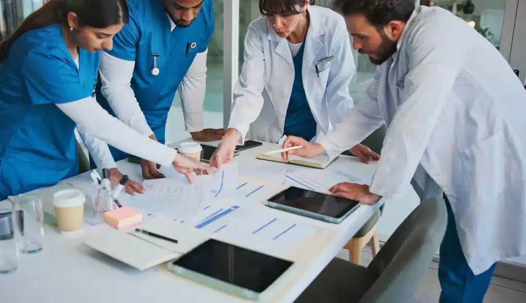 meeting in hospital with documents for patient diagnosis